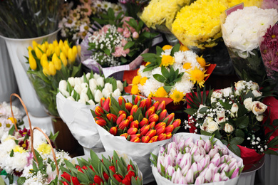 Photo of Assortment of beautiful flowers at wholesale market