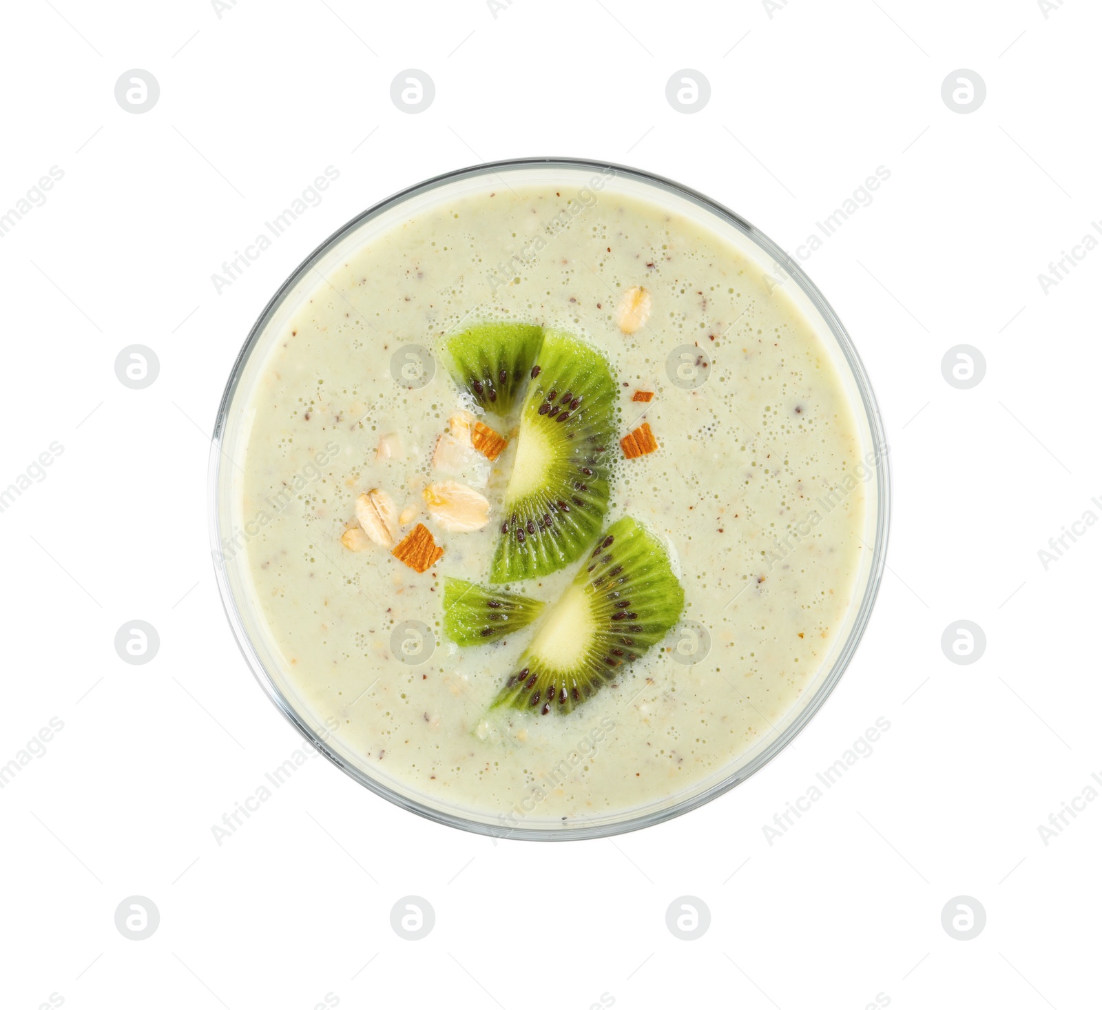 Photo of Glass of tasty kiwi smoothie with oatmeal on white background, top view