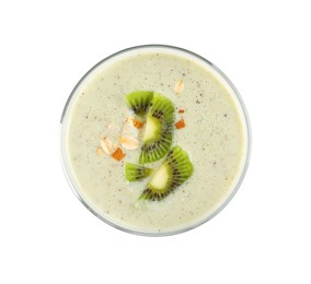 Photo of Glass of tasty kiwi smoothie with oatmeal on white background, top view