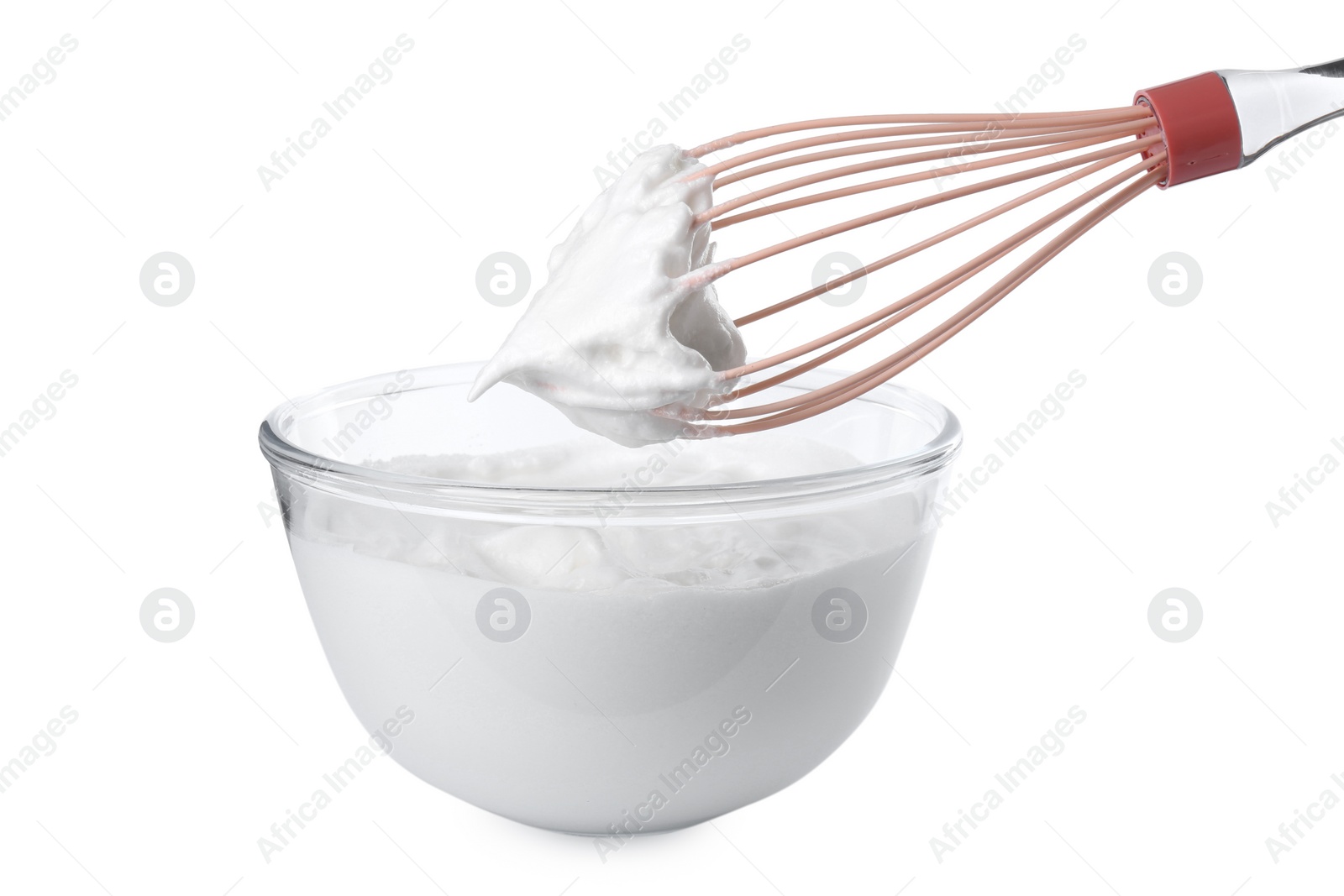 Photo of Bowl with whipped cream and whisk isolated on white