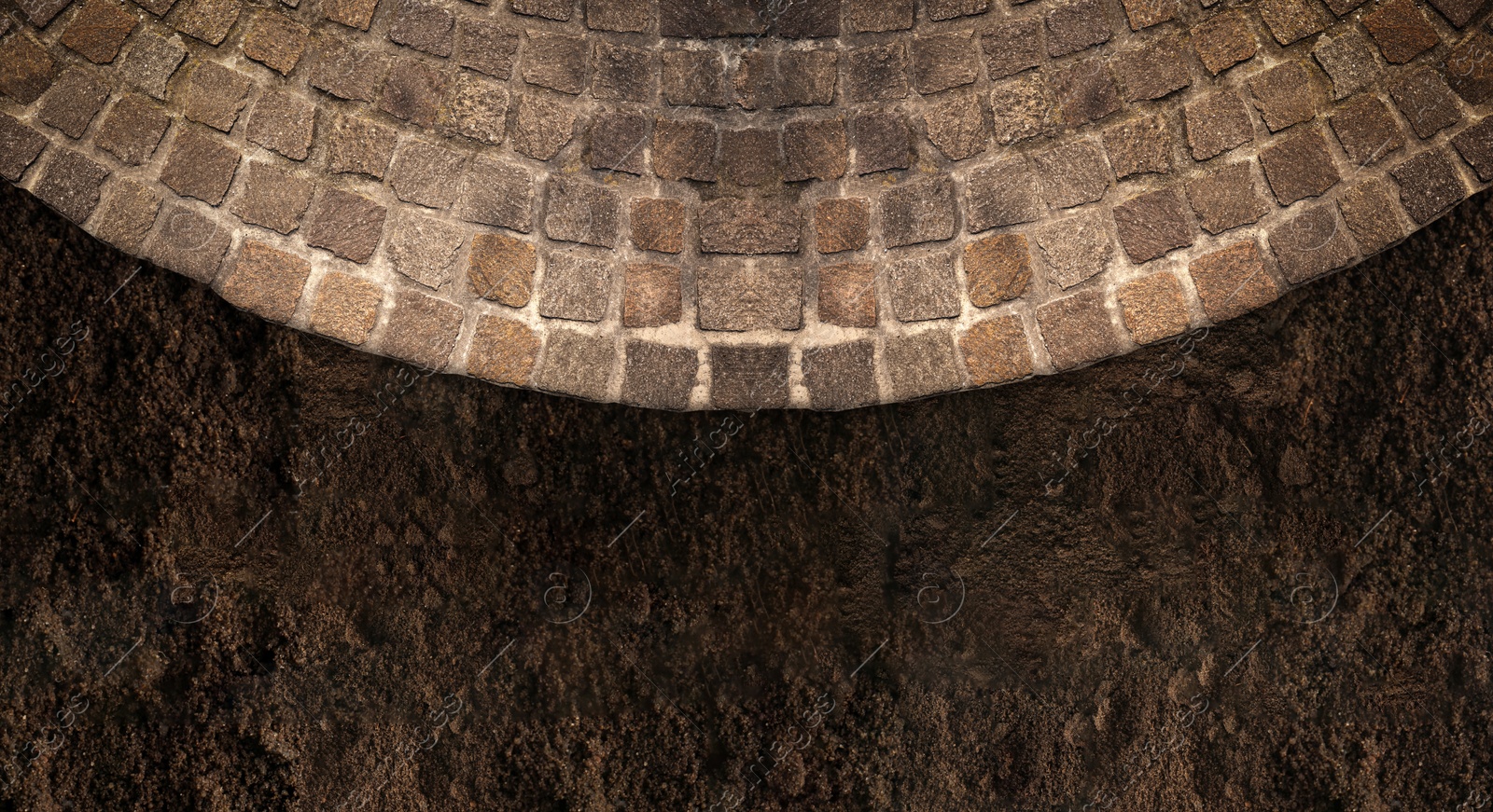 Image of Stone tiled surface and ground outdoors, top view