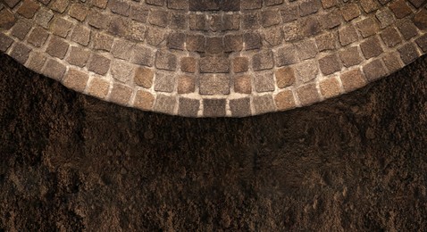 Stone tiled surface and ground outdoors, top view