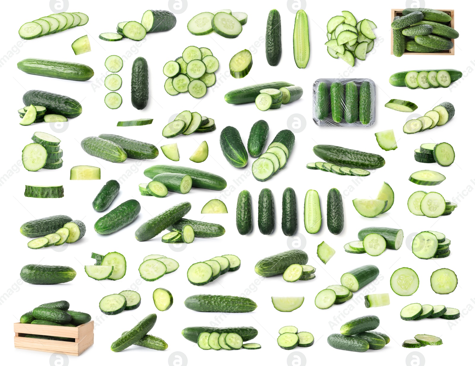 Image of Set with whole and sliced cucumbers on white background