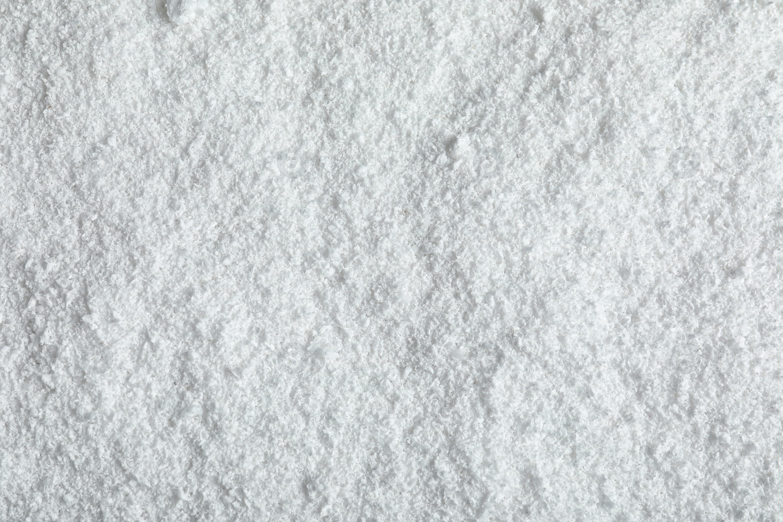 Photo of Pile of white snow as background, top view