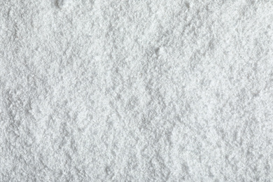 Pile of white snow as background, top view