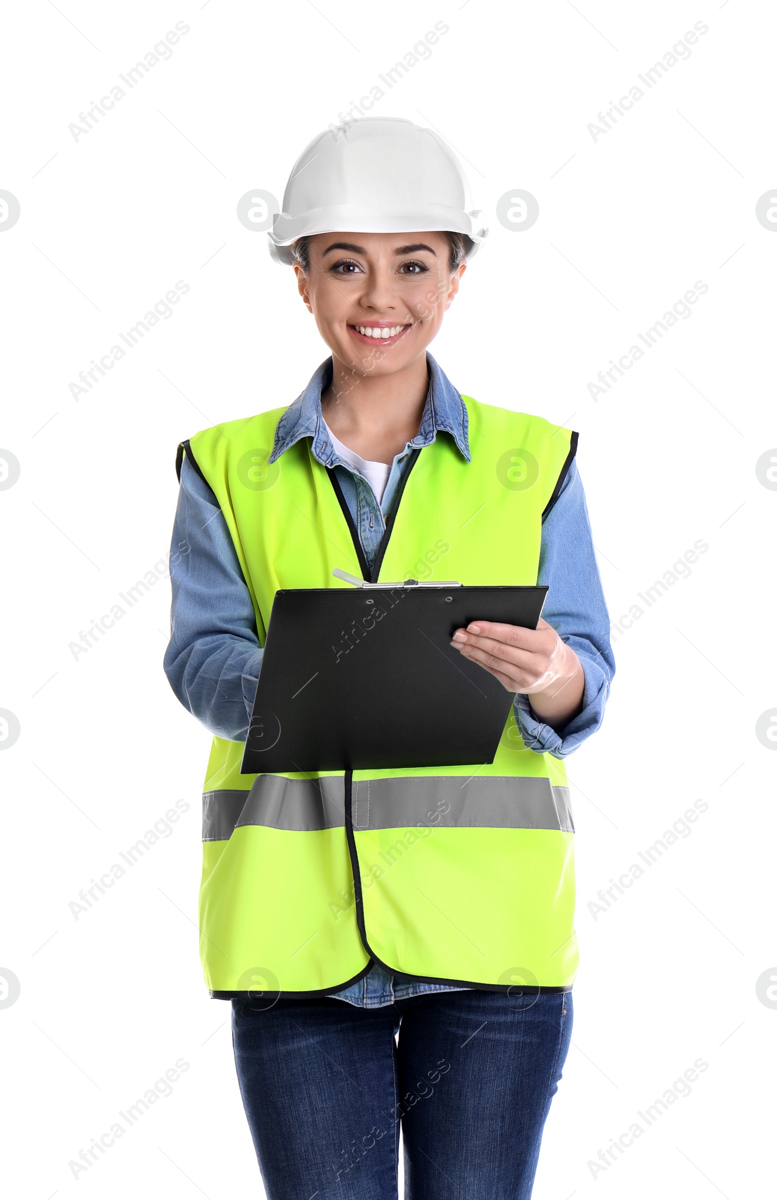 Photo of Female industrial engineer in uniform with clipboard on white background. Safety equipment