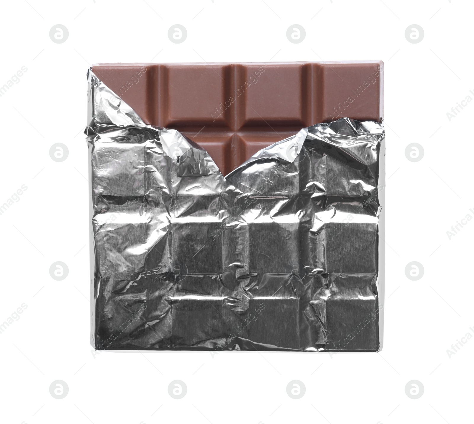 Photo of Delicious milk chocolate bar wrapped in foil isolated on white