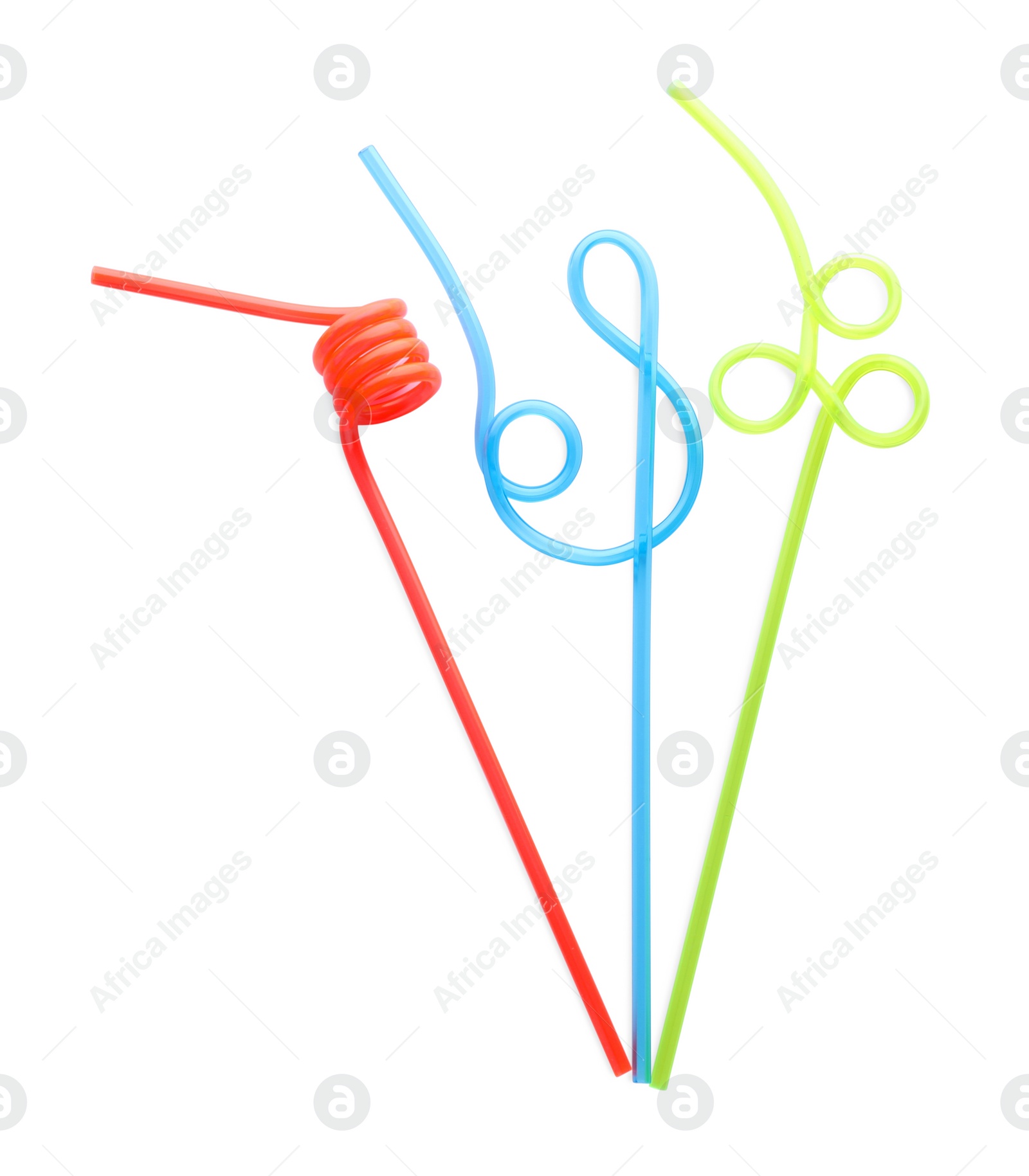 Photo of Color plastic cocktail tubes on white background, top view