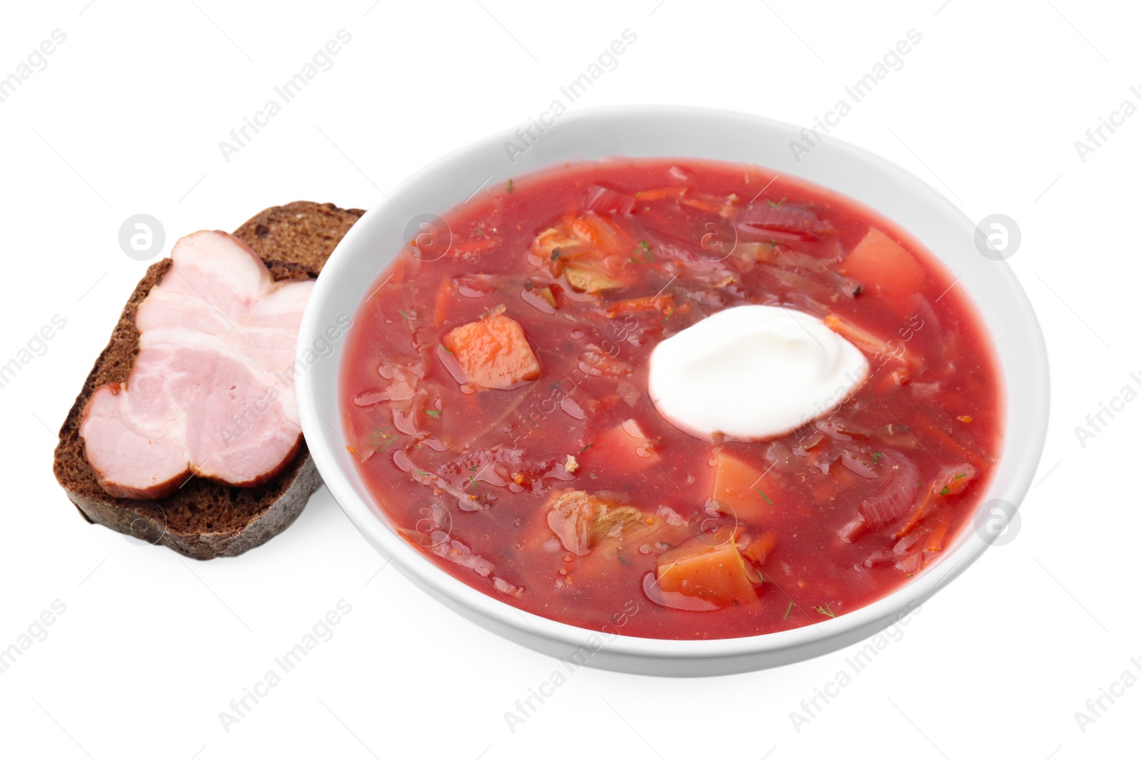 Photo of Tasty borscht and bread with ham isolated on white