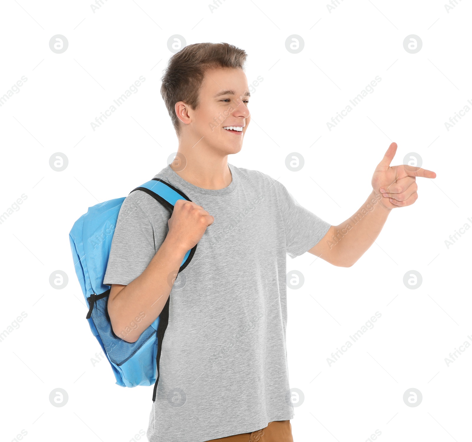 Photo of Teenager boy in casual clothes on white background