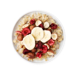 Delicious oatmeal with freeze dried berries, banana and hazelnuts isolated on white, top view