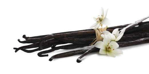 Photo of Vanilla pods and flowers isolated on white