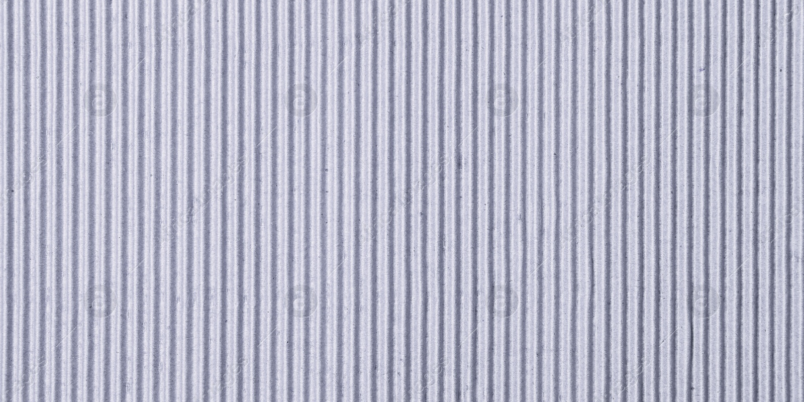 Image of Wall paper design. Grey corrugated sheet of cardboard as background