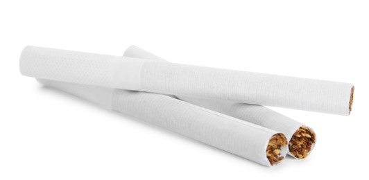 Photo of Cigarettes with filters isolated on white. Bad habit