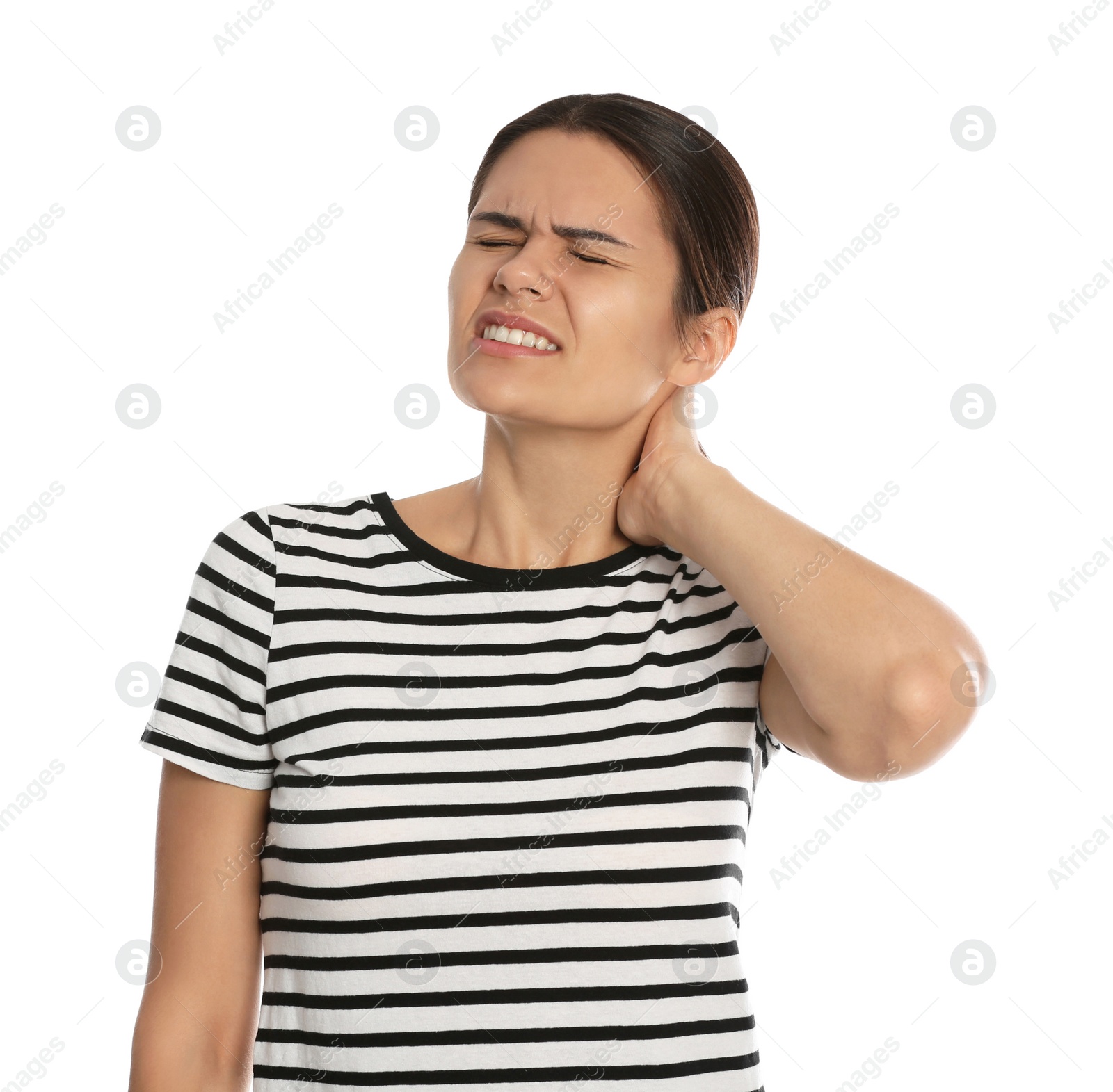 Photo of Young woman suffering from neck pain on white background