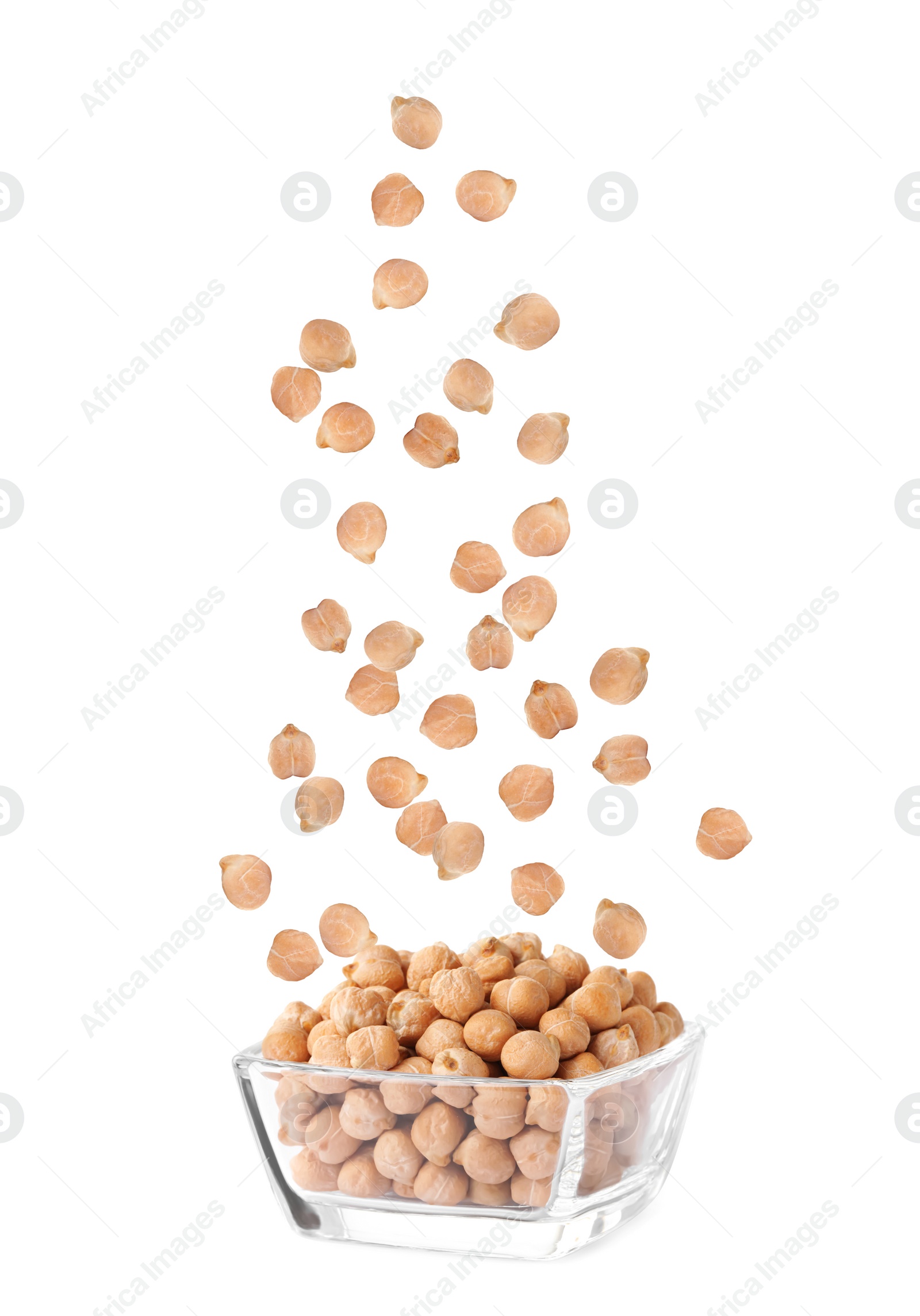 Image of Raw chickpeas falling into bowl on white background
