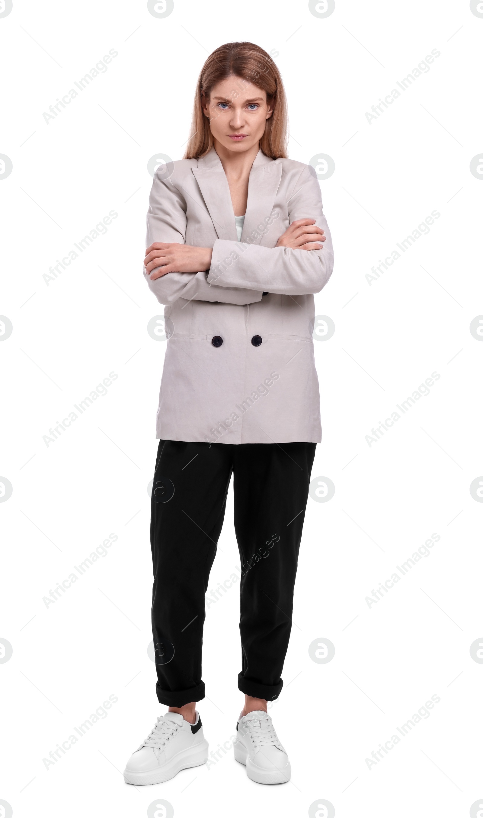 Photo of Beautiful businesswoman crossing arms on white background