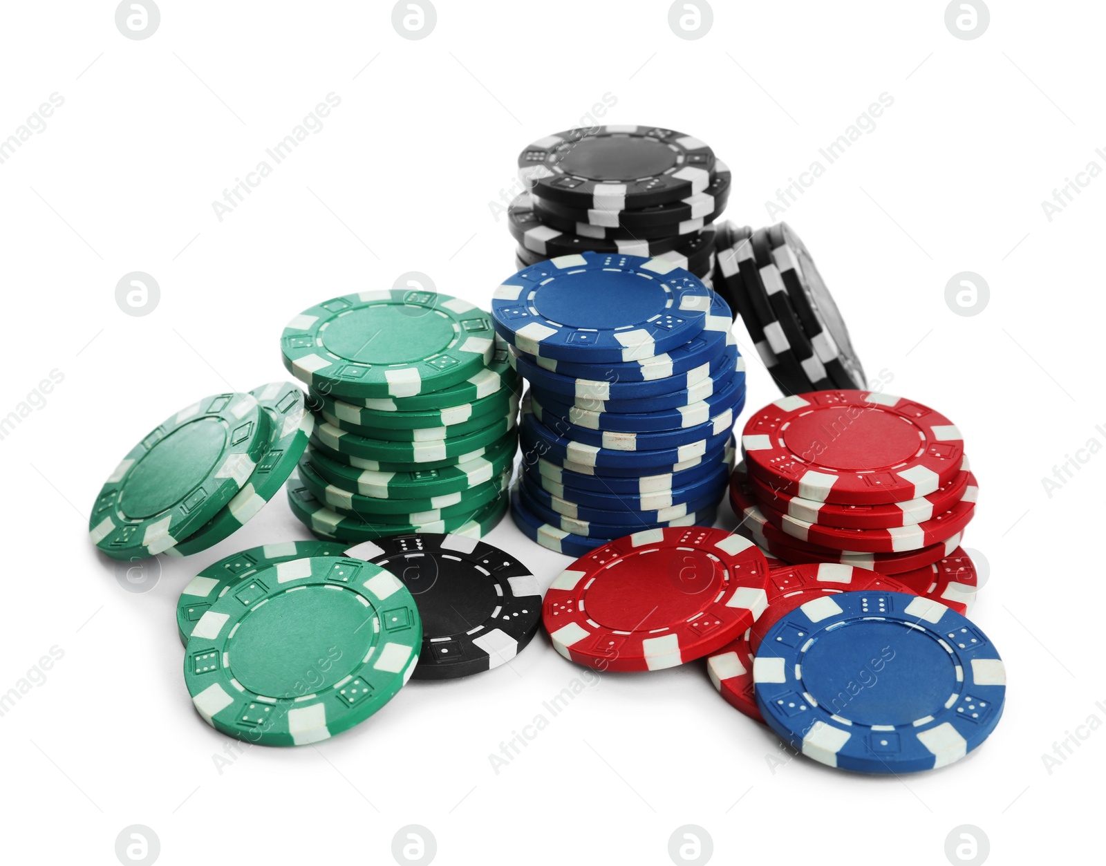 Photo of Plastic casino chips stacked on white background. Poker game