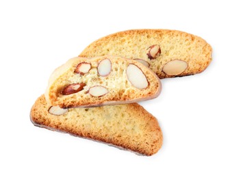 Photo of Slices of tasty cantucci on white background, top view. Traditional Italian almond biscuits