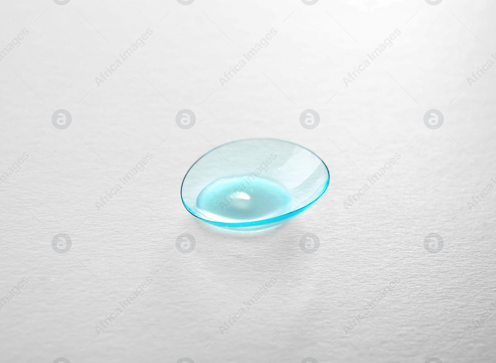 Photo of Contact lens on light background