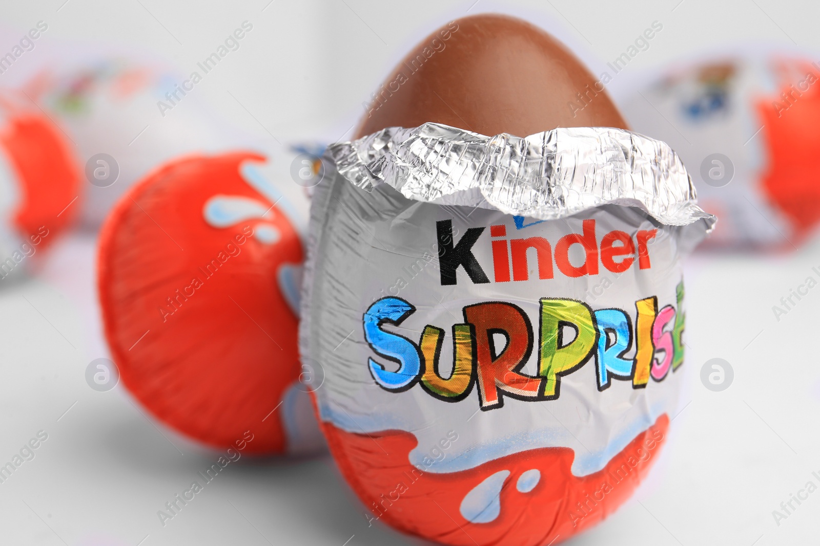 Photo of Sveti Vlas, Bulgaria - June 27, 2023: Kinder Surprise Eggs on white background, closeup