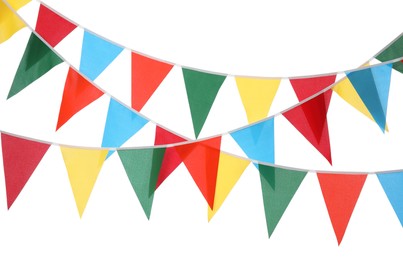 Photo of Buntings with colorful triangular flags on white background. Festive decor