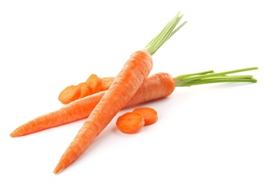 Photo of Whole and cut fresh carrots on white background