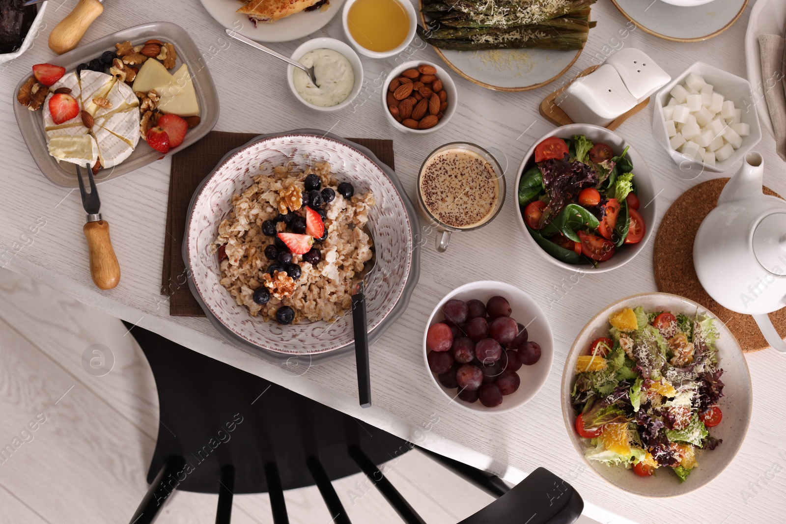 Photo of Many different dishes served on buffet table for brunch, flat lay