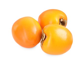 Photo of Delicious ripe juicy persimmons isolated on white