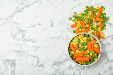 Photo of Flat lay composition with frozen vegetables on marble background