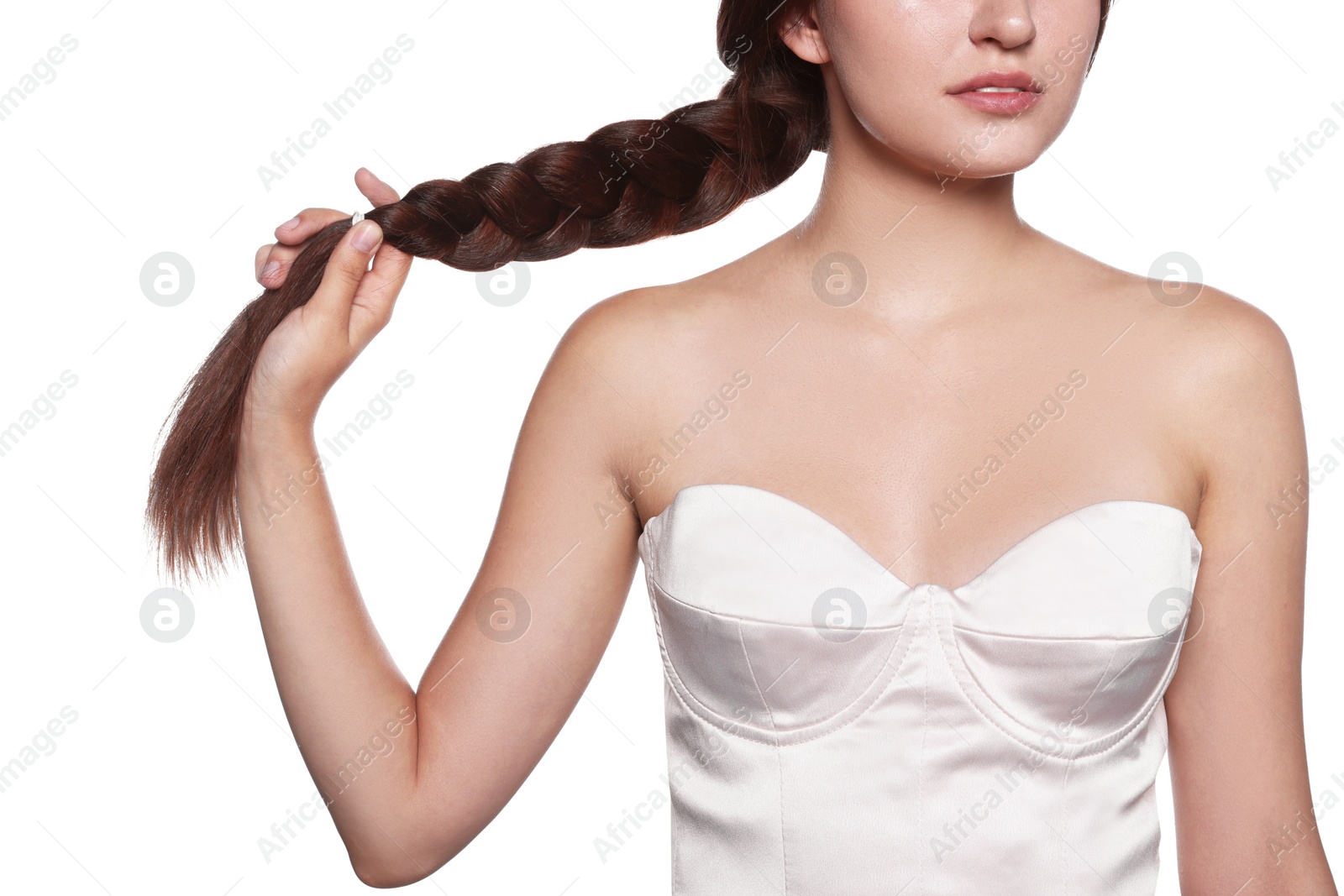 Photo of Beautiful young woman with healthy strong hair on white background, closeup