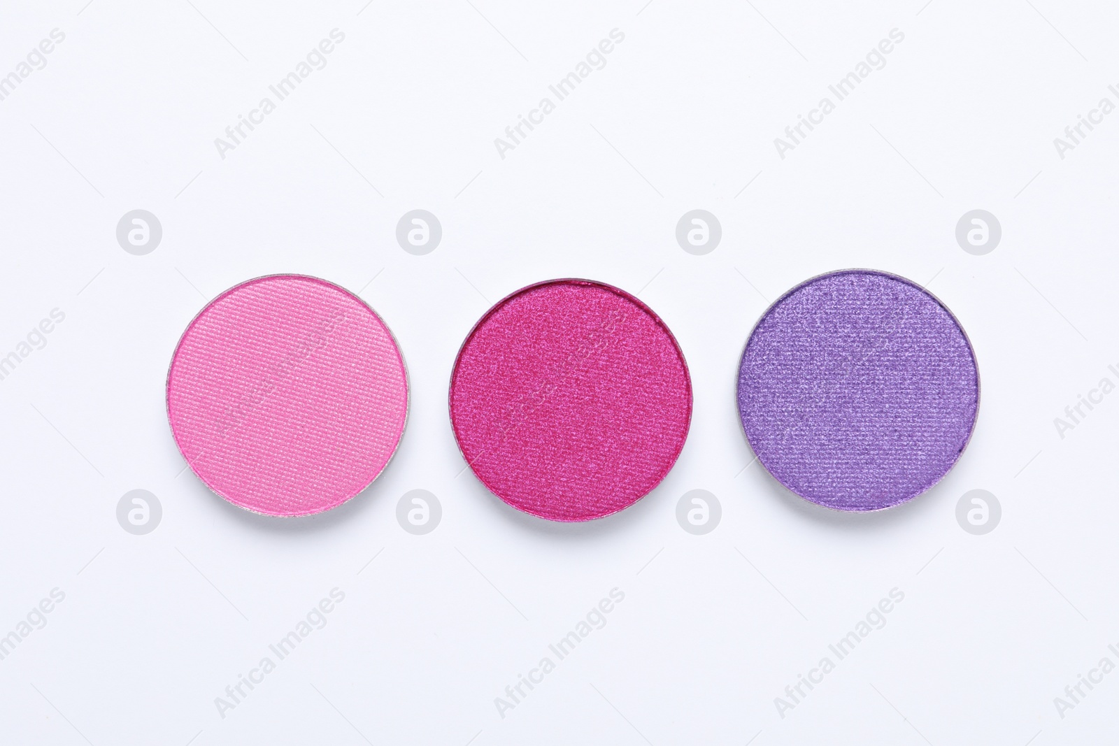 Photo of Beautiful eye shadow refill pans on white background, flat lay