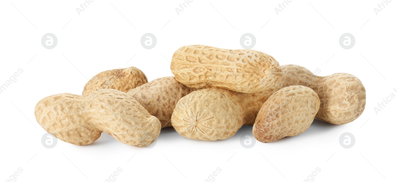 Photo of Pile of fresh unpeeled peanuts isolated on white
