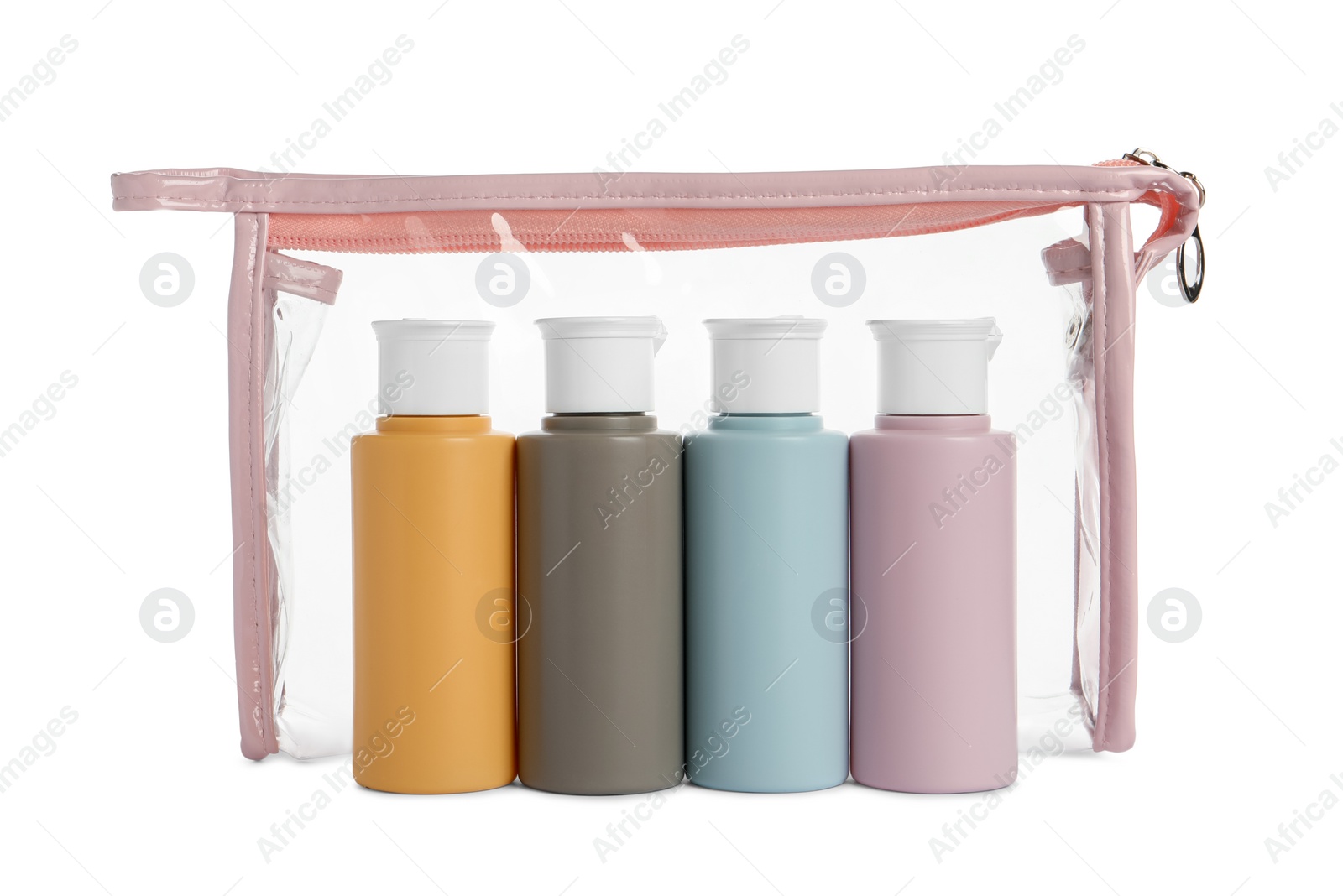 Photo of Cosmetic travel kit with plastic bag isolated on white