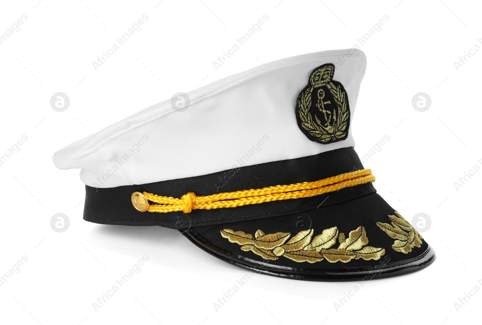 Photo of Peaked cap with accessories isolated on white