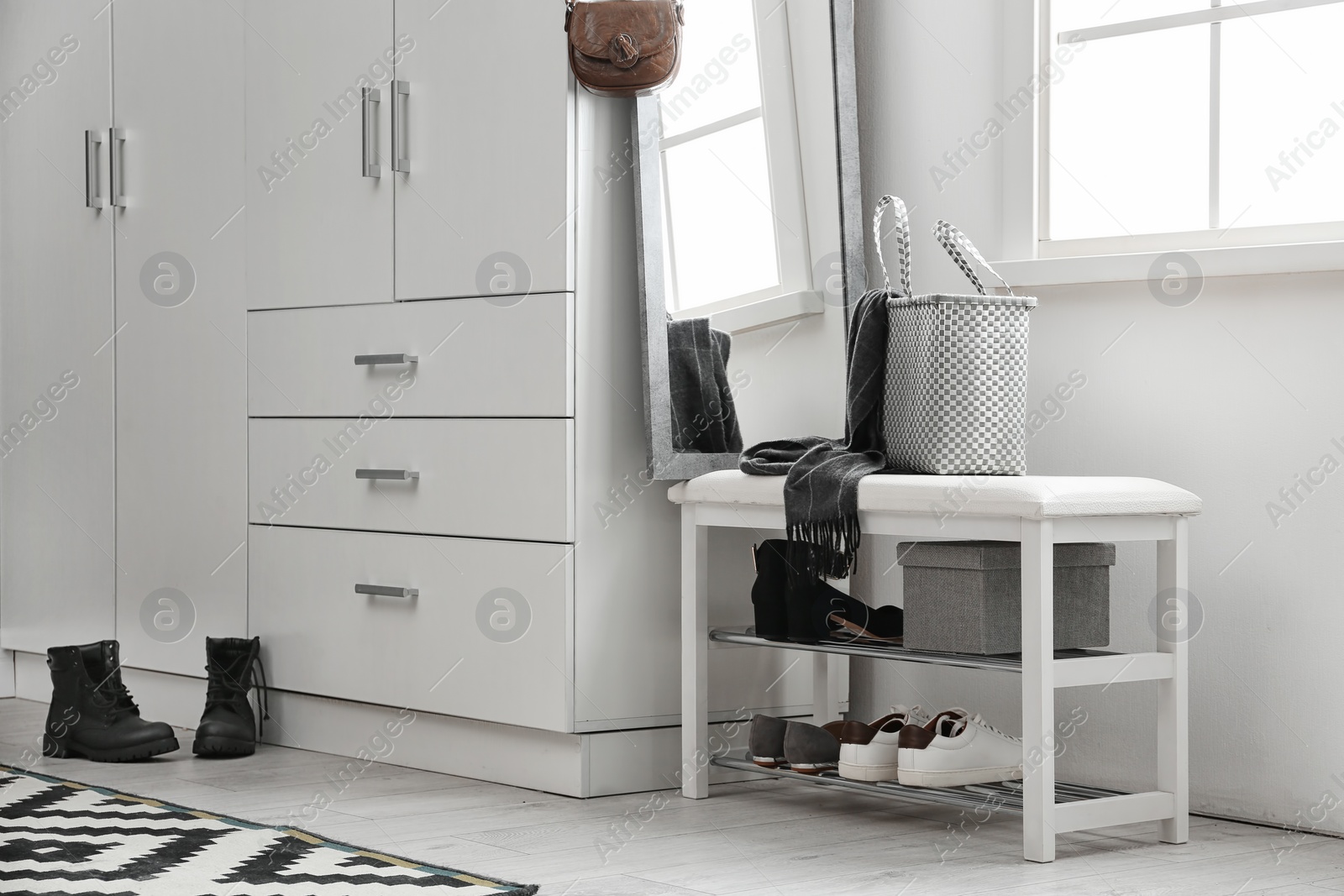 Photo of Stylish hallway interior with large wardrobe