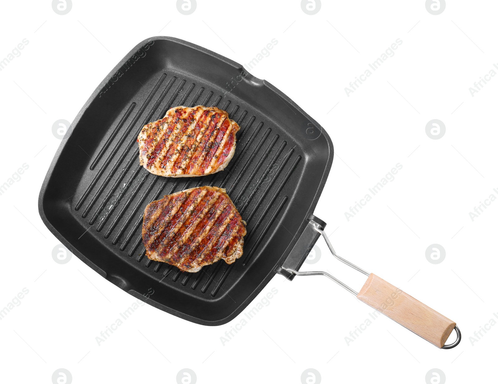 Photo of Grill pan with delicious pork steaks isolated on white, top view