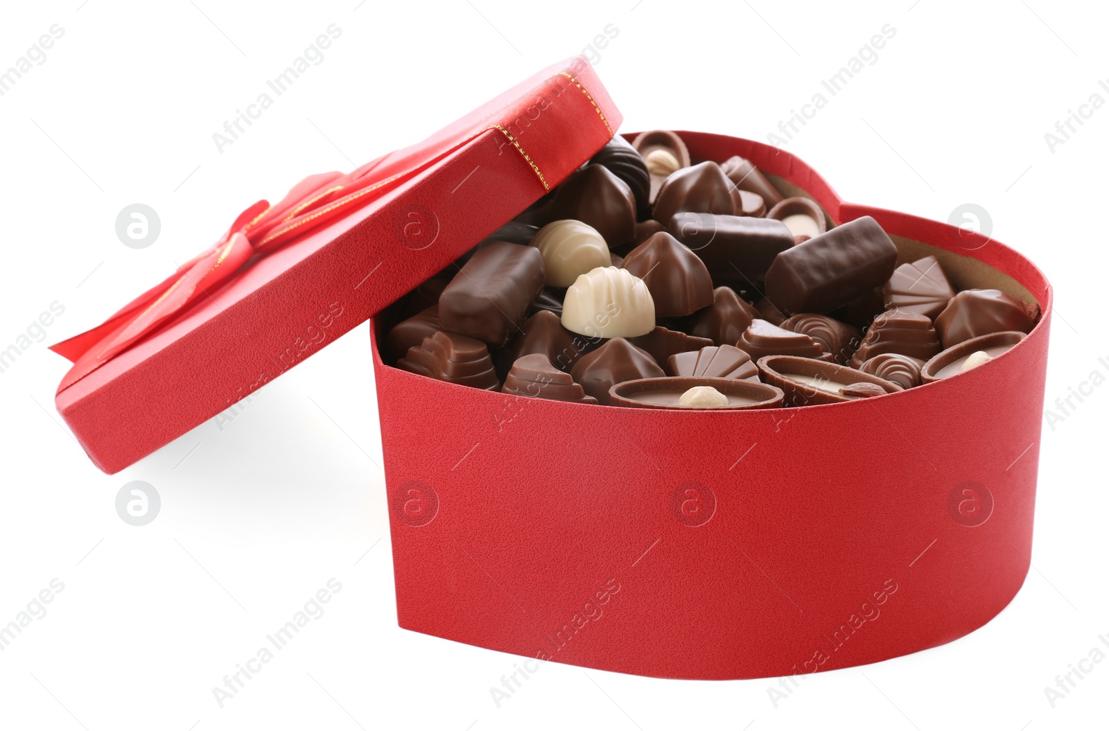Photo of Heart shaped box with delicious chocolate candies on white background