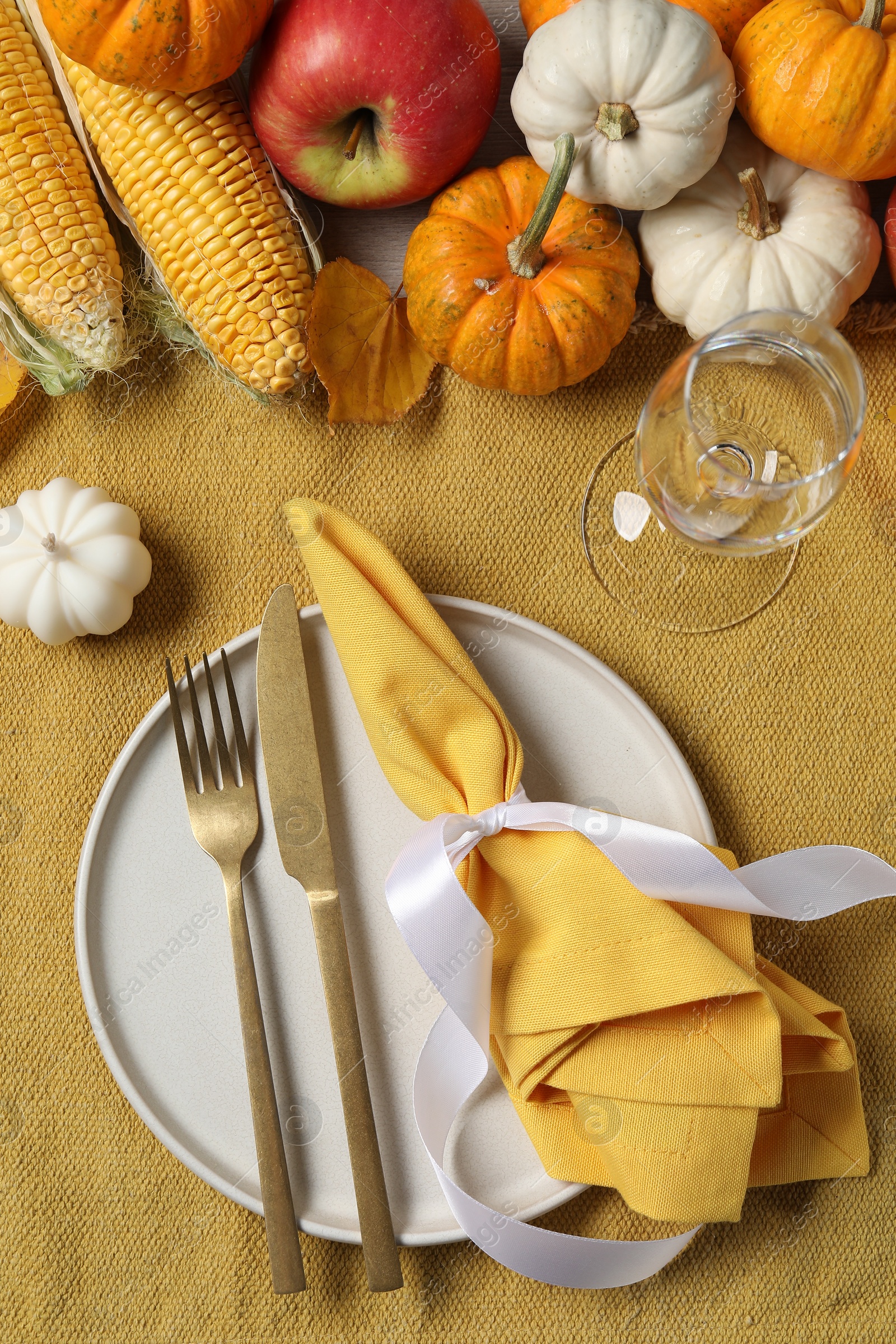 Photo of Happy Thanksgiving day. Beautiful table setting and autumn decoration, flat lay