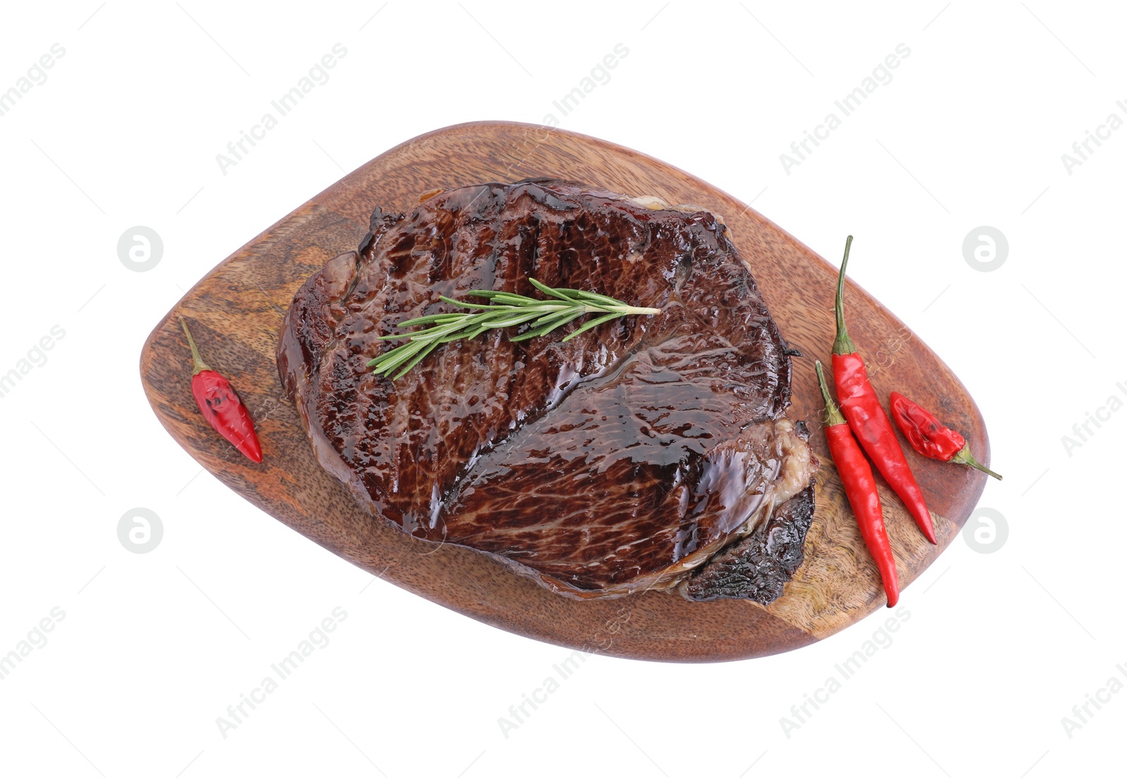 Photo of Wooden board with delicious fried beef meat, pepper and rosemary isolated on white, top view