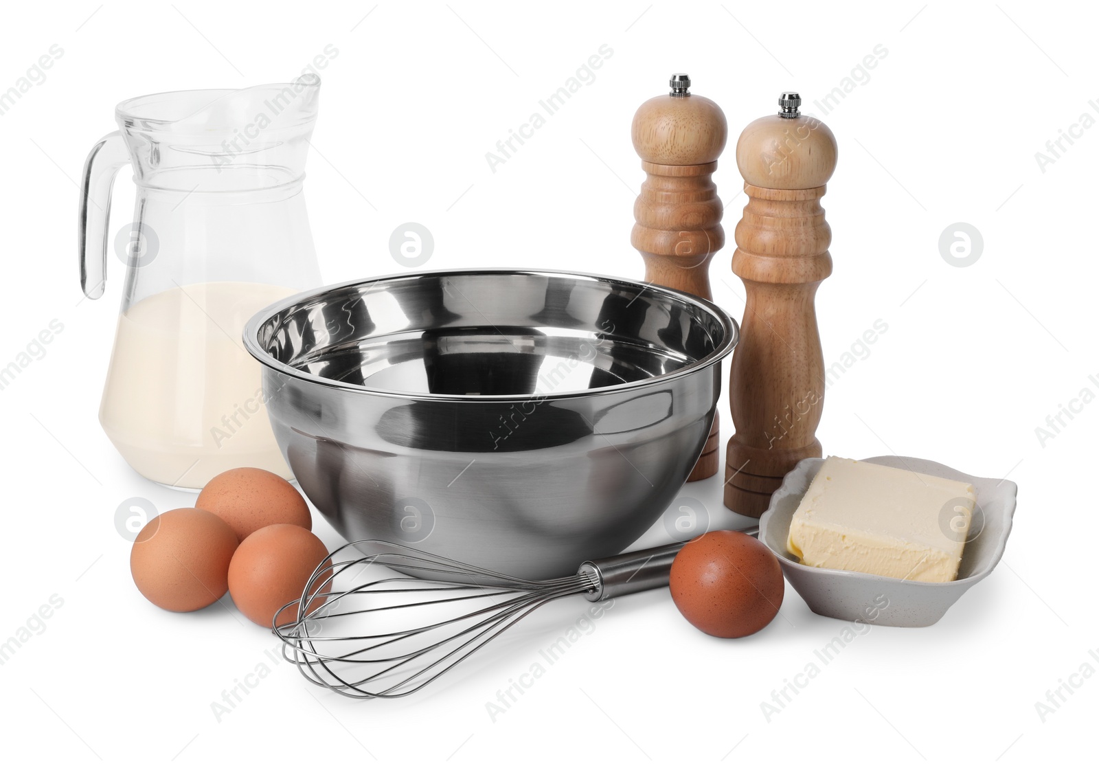 Photo of Metal whisk and dough ingredients isolated on white