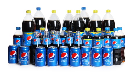MYKOLAIV, UKRAINE - FEBRUARY 10, 2021: Different bottles and cans of Pepsi on white background