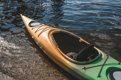Modern kayak on river, closeup. Summer camp activity