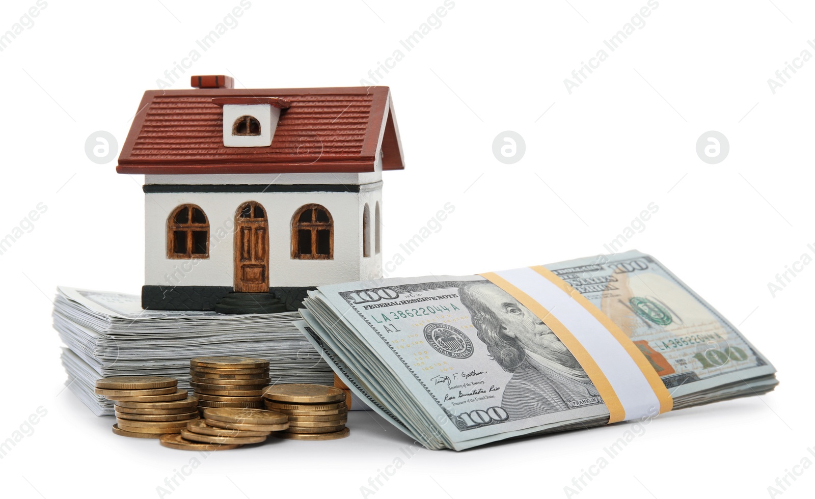 Photo of House model with money on white background