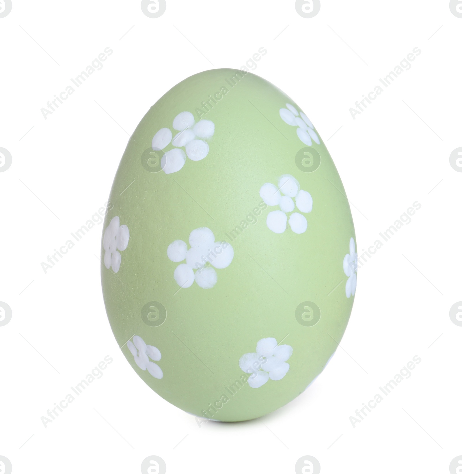 Photo of Painted green egg with flower pattern isolated on white. Happy Easter