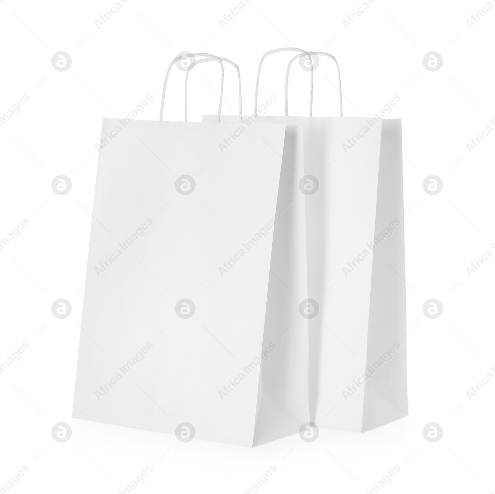 Photo of Two paper shopping bags isolated on white