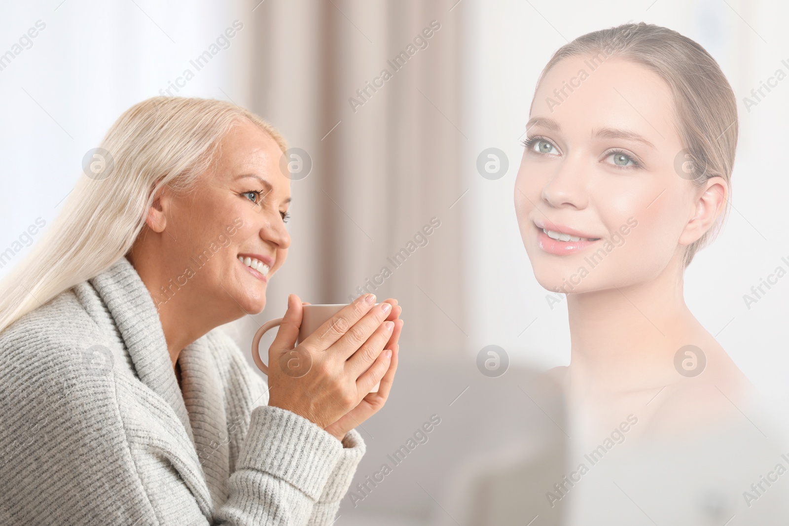 Image of Mature woman remembering old times. Translucent picture of young girl showing her in her youth