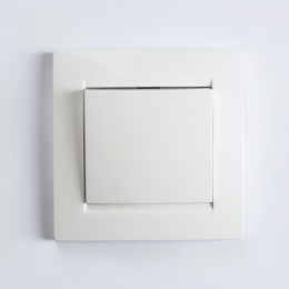 Photo of Light switch on white background. Electrician's equipment