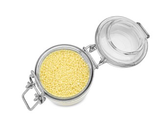 Glass jar of raw couscous isolated on white, top view