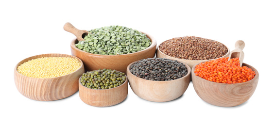 Photo of Different types of legumes and cereals on white background. Organic grains
